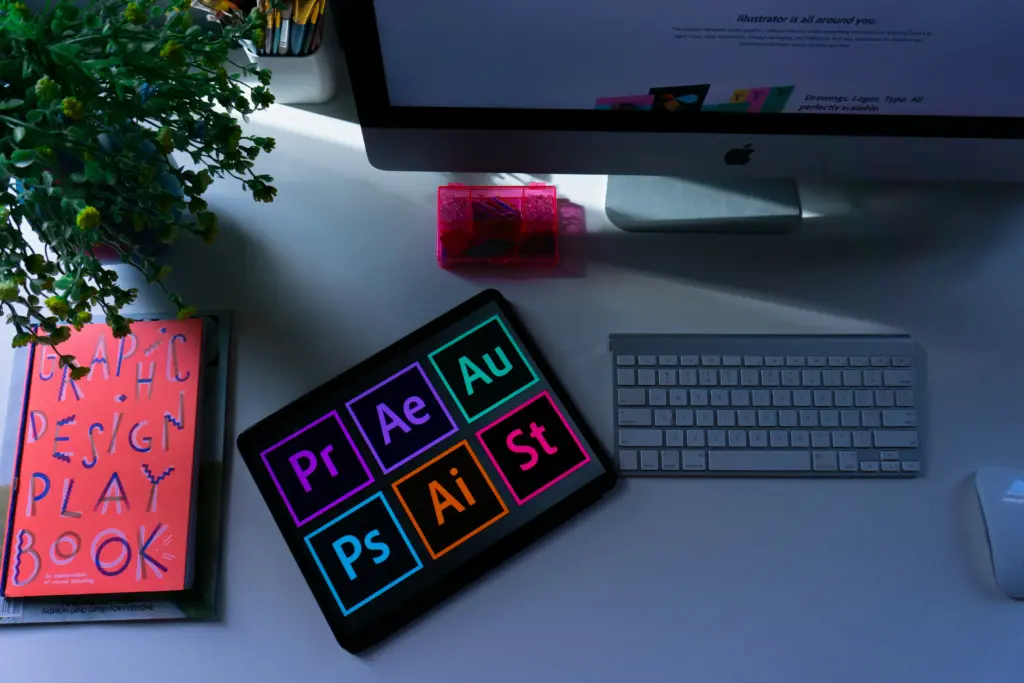 Programy Adobe do projektowania graficznego na ekranie laptopa